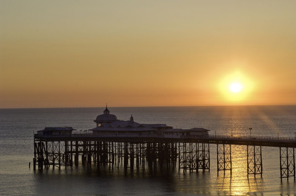 View of Llandudno Pier at sunset